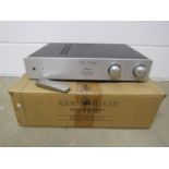 A boxed Audio Analogue Puccini Special Edition integrated amplifier with remote