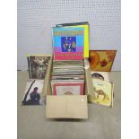 A collection of assorted LPs including The Steve Miller Band, Kate Bush,