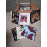 A box of assorted LPs including The Smiths, U2, Talking Heads etc.