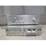 A Sharp SM-1144 stereo amplifier and a JVC cassette deck