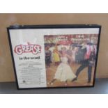 A framed and glazed UK quad film poster - Grease