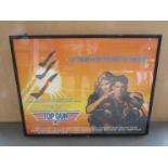 A framed and glazed UK quad film poster - Top Gun