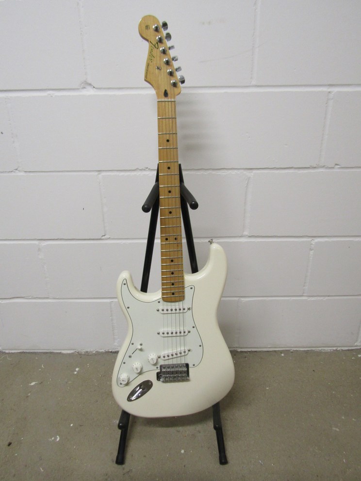 A 2016 Fender Mexican Stratocaster (MIM) with cream body, maple neck,