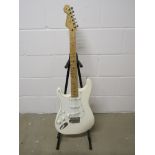 A 2016 Fender Mexican Stratocaster (MIM) with cream body, maple neck,