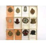 A collection of Irish regiment badges including North Irish Horse and Connaught Rangers.
