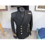 A WWII LT/CDR uniform with Kings Crown buttons and 1939-1945 Star, Atlantic Star, Africa Star,