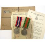 A WWII pair of medals with documents to 7358520 CPL. E.W. BUTTON R.A.M.C.