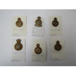 Six various Victorian and George V Life Guards and Hussars cap badges including 1st and 2nd Life