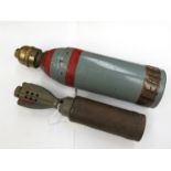 An Incendiary bomb (relic) together with a IS PR shell head with brass fuse (2)