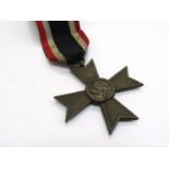 A German War Merit Cross with original ribbon