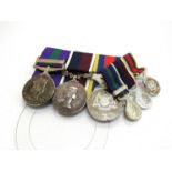 An EIIR medal group of three consisting of General Service Medal (GSM) with Malaya clasp named to