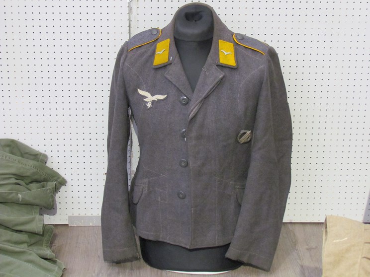 A Third Reich era German Luftwaffe Battledress blouse with Private rank (Flying) insignia to collar,