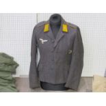 A Third Reich era German Luftwaffe Battledress blouse with Private rank (Flying) insignia to collar,