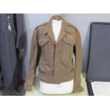 A WWII British Army 1939 pattern Battledress blouse size 17 and dated 1939.