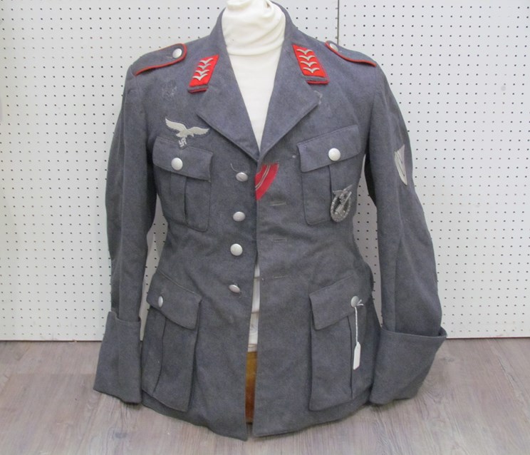 A Third Reich era German Luftwaffe blouse with Hauptgefreiter (Flak / Anti-Aircraft) insignia to