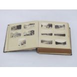 An India themed photograph album with contents including artillery, tanks,