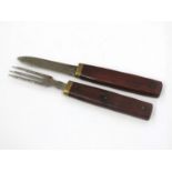 A campaign Sheffield-made knife and fork set