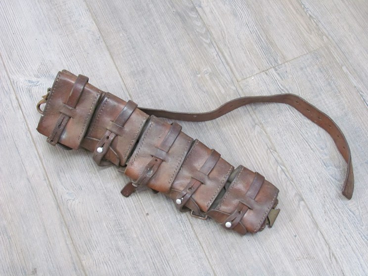 A brown leather five pouch bandolier,