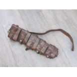 A brown leather five pouch bandolier,