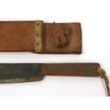 A WWI 1918 dated machete with original 1918 scabbard