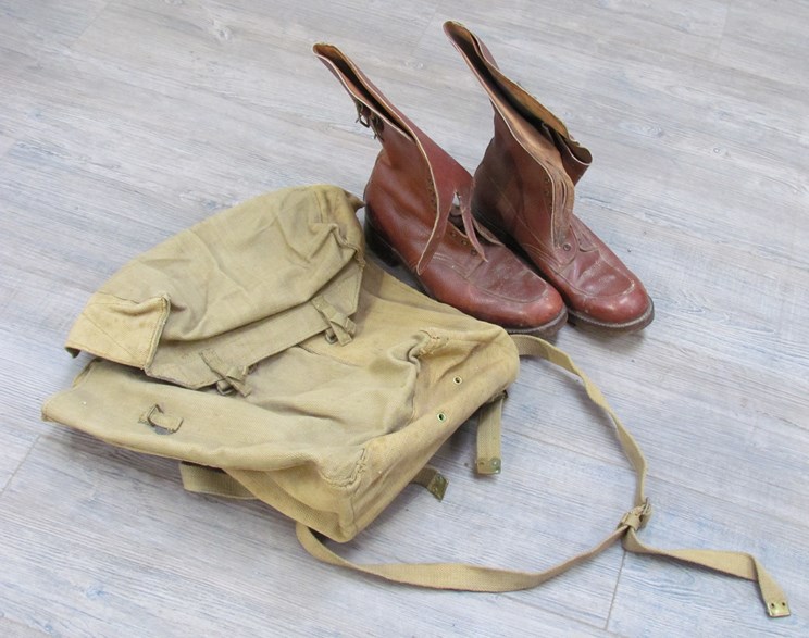 A pair of WWII officer's field service brown leather boots together with a 1945 dated backpack (2)