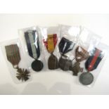 A collection of WWI medals including French,