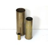 Two shell cases dated 1917 and 1942,