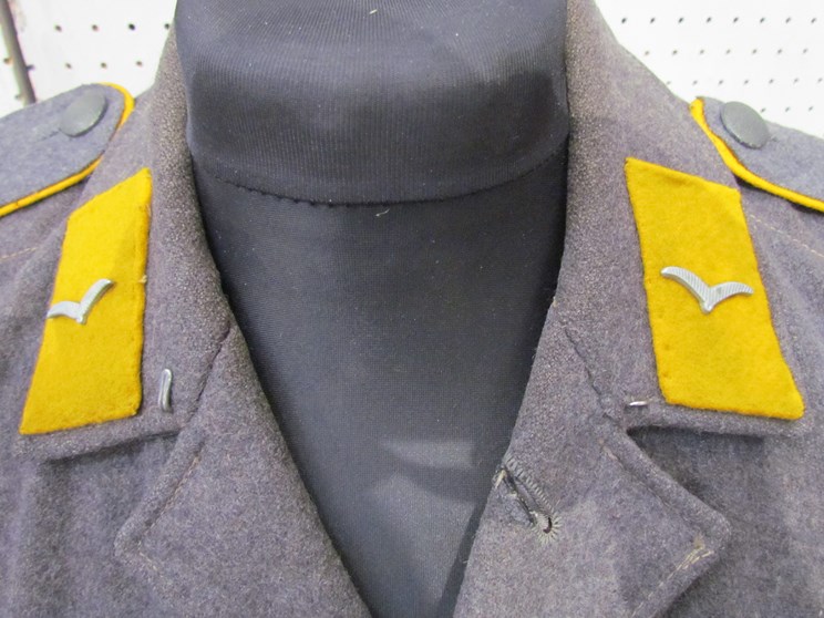 A Third Reich era German Luftwaffe Battledress blouse with Private rank (Flying) insignia to collar, - Image 4 of 4