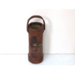 A late 19th/early 20th Century brown leather shell carrier,