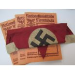 A German triangular pennant together with three propaganda booklets. Buyer to determine flag age.