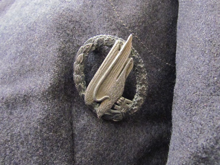 A Third Reich era German Luftwaffe Battledress blouse with Private rank (Flying) insignia to collar, - Image 3 of 4