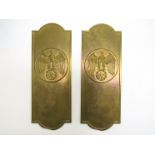 A pair of Third Reich era German pressed brass door finger plates designed by Arno Breker, Berlin,