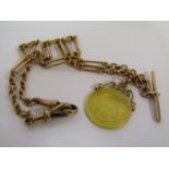 A 9ct gold watch chain with T-bar and 1 Pond gold coin