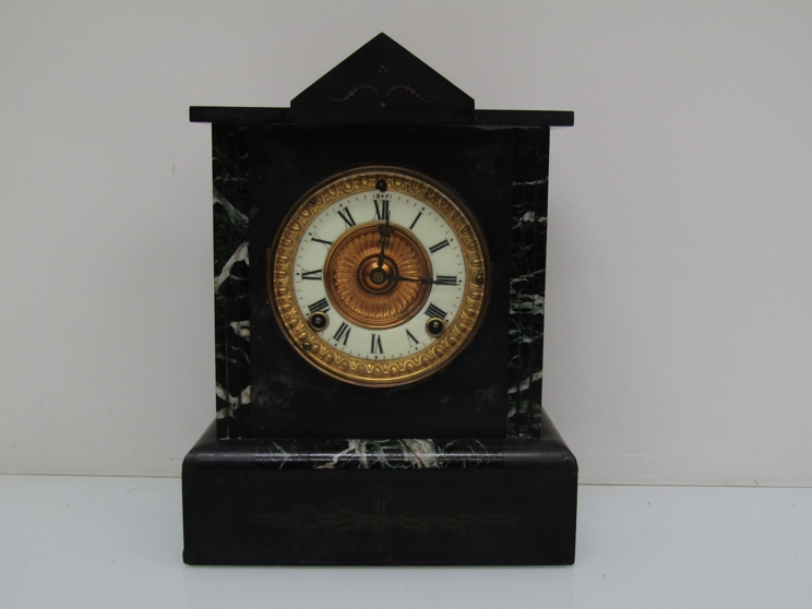 A 19th Century slate mantel clock with American twin train spring driven movement,