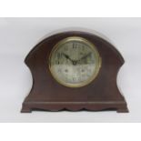 An Edwardian mahogany mantel clock, silvered Arabic dial with platform escapement striking movement,