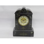 A Victorian slate mantel clock with 8 day French drum movement,