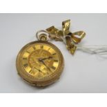 An early 20th Century 18ct gold lady's fob watch with gilded Roman dial,