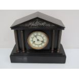 A Victorian slate mantel clock of architectural form, striking American 8 day movement,