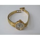 A Nisus 18ct gold lady's bracelet watch