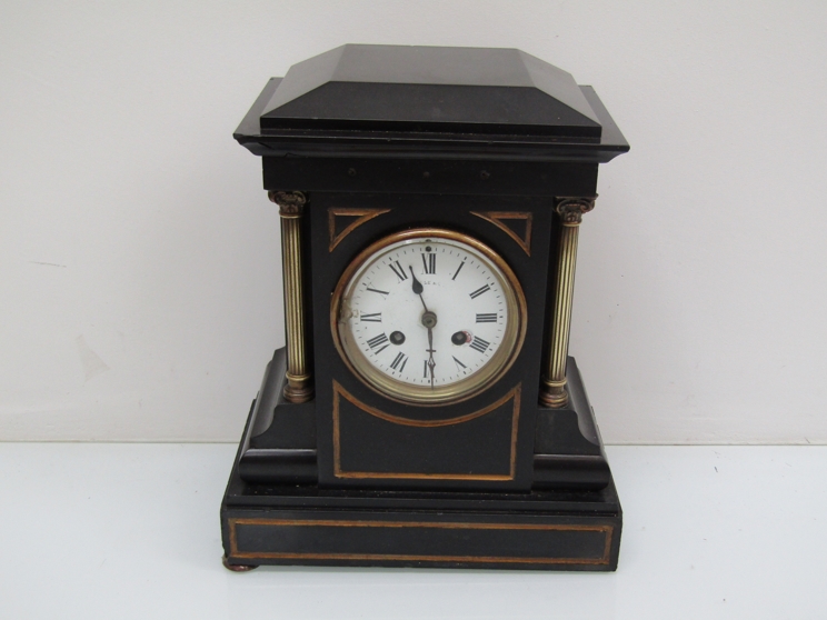 A Victorian slate mantel clock with 8 day French drum movement signed Maple & Co Paris, 32.