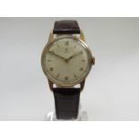 TUDOR: a mid 20th Century 9ct gold cased gent's wristwatch, silvered dial with Arabic numerals,