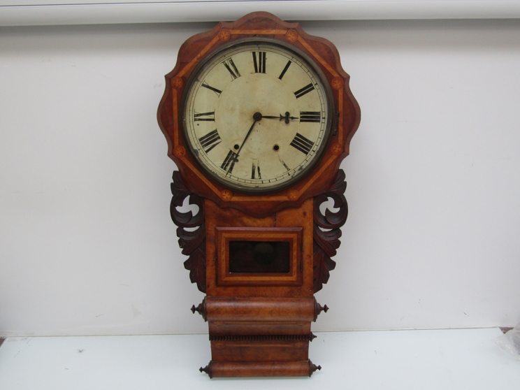 A late 19th Century American walnut and inlaid drop dial wall clock with 8-day spring driven