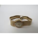 OMEGA: A 9ct gold Ladymatic bracelet watch,