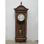A 20th Century oak cased wall clock, Roman enamelled dial signed Sir John Bennett, London,