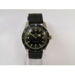 A Services steel cased wristwatch with black dial and bezel,