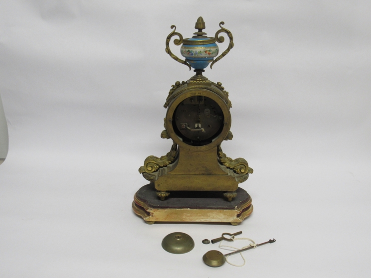 A 19th Century French Ormolu mantle clock with raised urn finial over Roman hand-painted dial, - Image 4 of 5