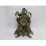 A large decorative 19th Century French ormulu table clock, the case with many rococo scrolls,