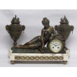 A 19th Century French marble and spelter figural clock with garniture ,8 day striking drum movement,