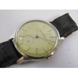 JAEGER-LECOULTRE: A mid 20th Century steel cased gents manual wind wristwatch with silvered dial