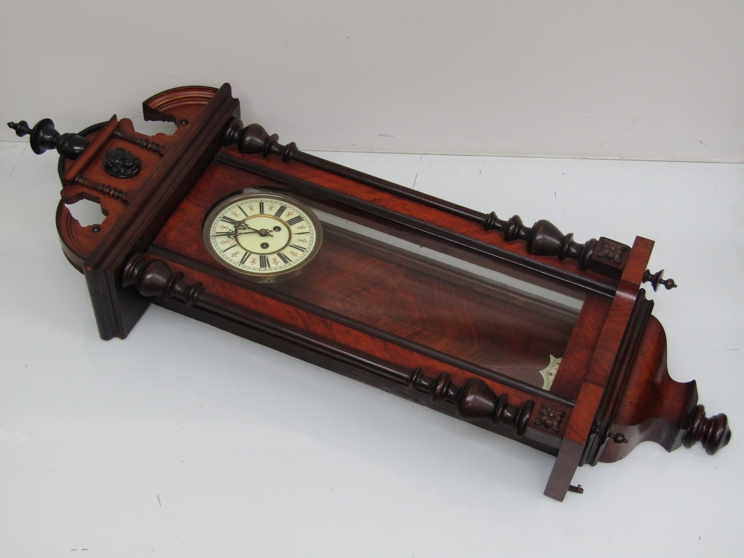 A 19th Century mahogany and ebonised Vienna style wall clock with Roman enamlelled dial,